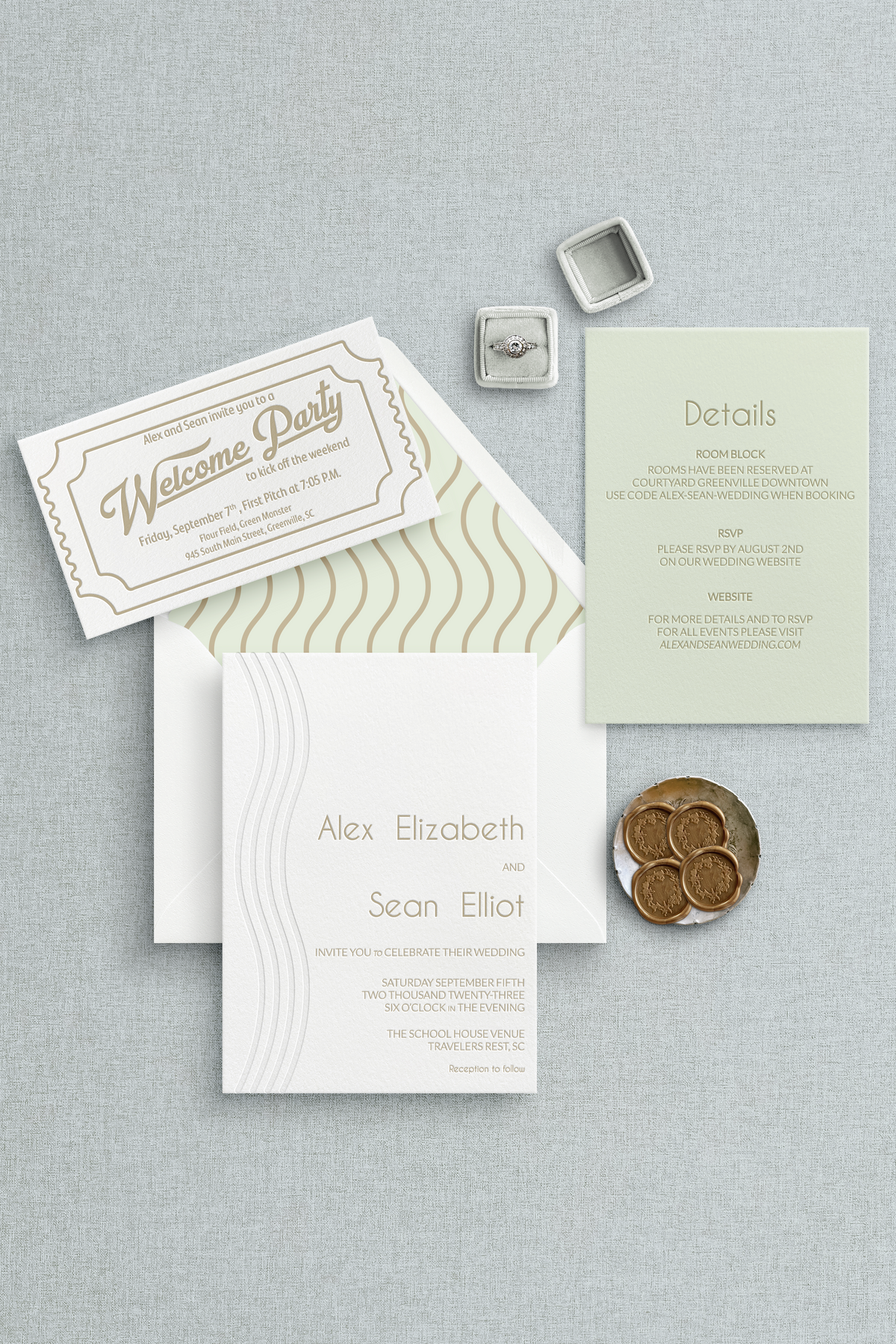 Custom letterpress wedding invitations with a baseball ticket welcome party card and the details card on green paper. 