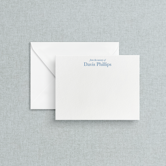 White card with letterpress print of "from the nursery of" in an italic serif font. Under it can be customized with the childs name. 