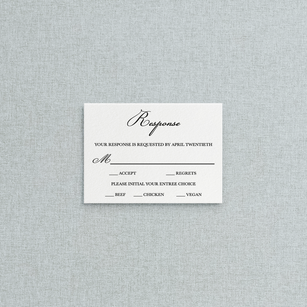 White letterpress mail-in RSVP to accompany your letterpress wedding invitation suite. Also gives guests their meal choice for the reception