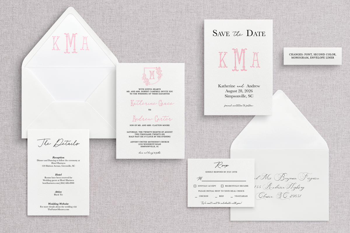 Customer letterpress wedding invitation suite with a pink monogram and floral crest. 