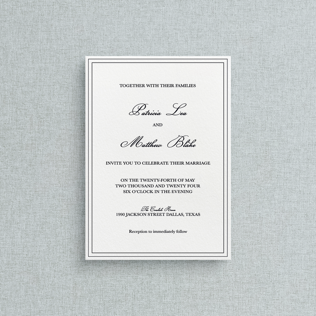 Semi-custom letterpress wedding inviations with a double line boarder around. 