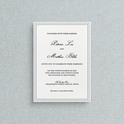 Semi-custom letterpress wedding inviations with a double line boarder around. 