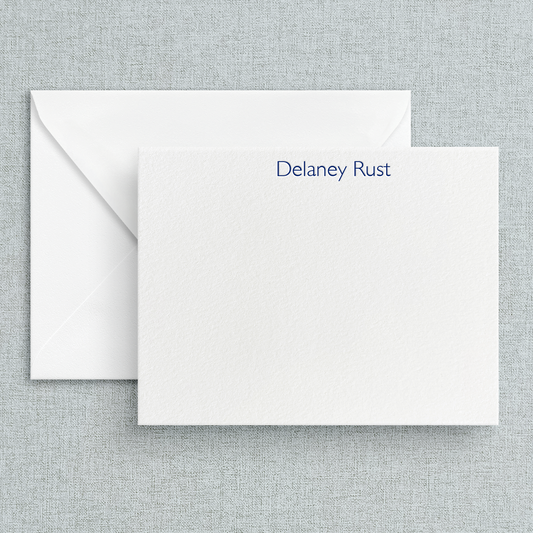 Customer lettrpress stationery set with the name printed in a sans serif font and blue ink.